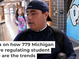 A student uses the unlocking mechanism as he leaves school for the day. Keith Srakocic/AP Photo